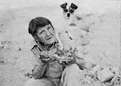 Helen Madden and her dog Goober II at her agate mine.
